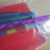 Red Notebook Purple Holographic Pencil Stacker Crayon 4-click Pen and Eraser Set - Image 3