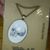 Vintage Style Anatomical Skull Glass Cabochon Pendant with chain - GoblinDreams