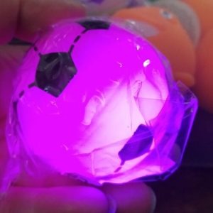 Pink light up small football with colourful LED ball inside - Hoot