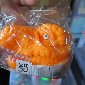 Orange Squishy Tyrannosaurus Rex Dinosaur Head - Liquid Filled with coloured beads inside - Hoot
