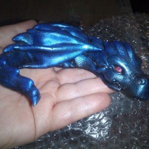 Medium Blue Laying Dragon Ornament Decoration (W/ red eyes and dark tint)