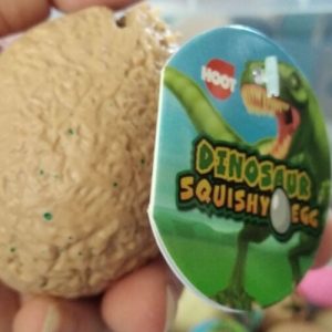 Light Brown Squishy Dinosaur Egg - Liquid Filled with baby Raptor Dino inside - Hoot